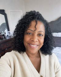 Aisha K., 38